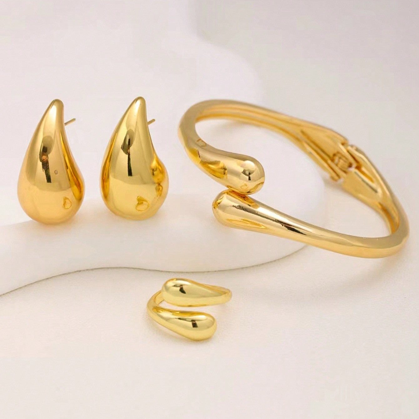 Drop Set in Stainless Steel – Earrings, Ring and Bracelet